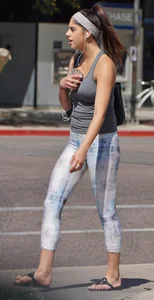 Flat ass brunette walking in leggings with big boobs