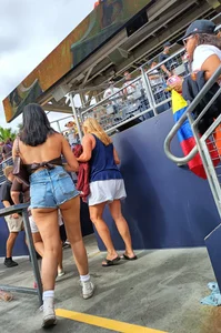 Latina MILF in orange leggings plus booty shorts