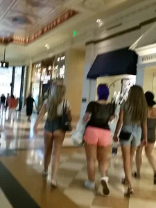 Big booty blonde showing a ton of her ass cheeks in shorts