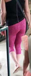 Milf shopping with a nice ass in tight maroon leggings