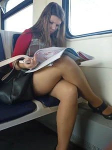 Milf in a Skirt Reading in a Public Train with Crossed Legs Creepshot
