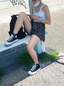 Unbelievably Hot Masked Girl in a Skirt And Sneakers Sitting On a Bus Stop With One Foot Placed on a Bench Almost Flashing Her Panties Street Creepshot