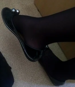 Feet Of a College Girl in Shoes And Black Pantyhose Closeup Creepshot