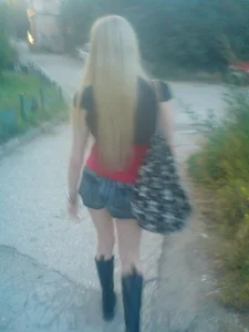 Skinny petite blonde in denim jeans and boots with very thin legs street creepshot