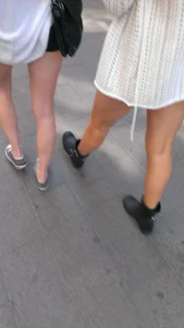 Street girlfriends in short dresses