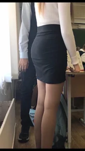 Hot College Blonde Girl’s Booty in a Skirt And Slim Legs in Pantyhose Classroom Photo