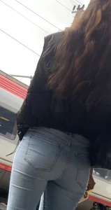Tight jeans ass at train station