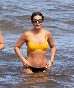 Frankie Bridge nip slips in a bikini on the beach