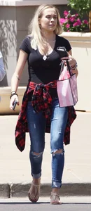 Hot blonde in jeans after shopping at Victoria Secret