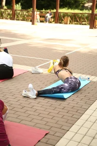 Girl in Yoga Pants Stretching on the Street Creepshot