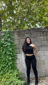 Hot Girl in a Top And Leggings Street Photos