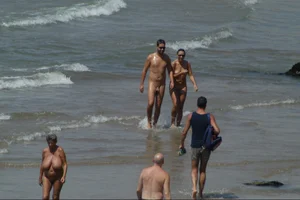 Girls on a nude beach in Sitges, Spain