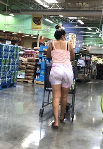 Thick Latina babe with a nice ass in tight patterned shorts