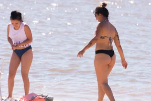 Candid beach girls in thongs