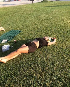 Candid girl chilling on the grass