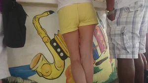 Milf in yellow shorts with vpl and a wedgie