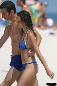 Beach voyeur girls in bikinis, thongs and topless