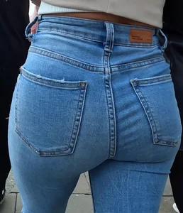 Tight blonde in blue jeans with nice bubble