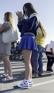 Teen wearing uniform skirt with awesome legs street creepshot