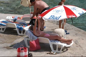 Nude girls on a beach in Hvar, Croatia