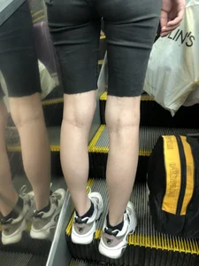 Long Skinny Legs and Hot Booty in Denim Shorts on a Subway Escalator Creepshots Series