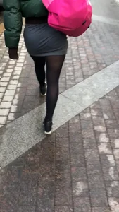 Candid girl in pantyhose walking down the street, creep video