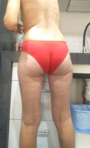 Topless wife in red panties home creepshot at the kitchen
