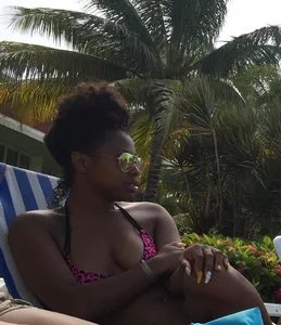 Black friends at the pool in bikinis