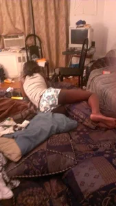 Black sexy girlfriend laying around in little shorts