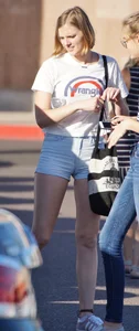 College babe in the parking lot in little denim shorts