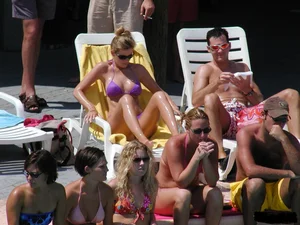 Beach voyeur girls in bikinis, thongs and topless