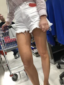 Awesome legs creepshot in white fringed shorts