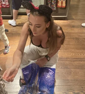 Dirty blond with her cleavage out at Disneyland