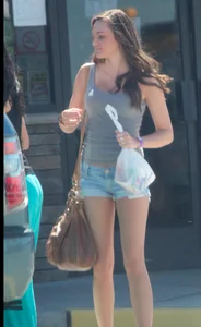 Beautiful tall teen in short denim shorts