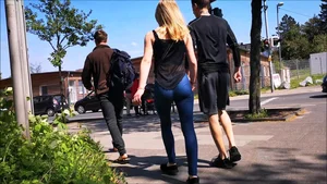 Blonde babe with a nice ass in tight blue wet look leggings