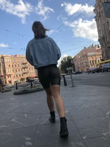 Amazing tall candid girl with long slim legs and booty in spandex shorts