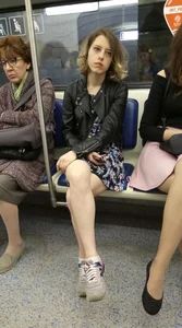 Girl in Leather Jacket and a Skirt with Skinny Legs Subway Train Candid