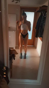 Hot and Fit Bespectacled Girl in a Top, Panties and Woolen Socks Mirror Selfies Gallery