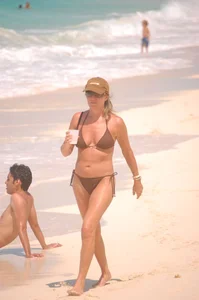 Various sexy candid girls in bikinis at the beach