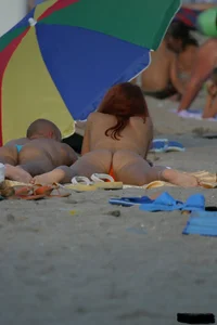 Beach voyeur girls in bikinis, thongs and topless
