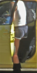 Skinny babe going to her car in little cotton shorts