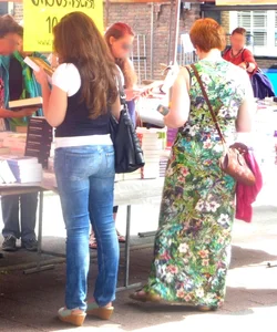 Sexy butt in blue jeans, girl at the street market creepshot