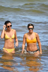 Frankie Bridge nip slips in a bikini on the beach