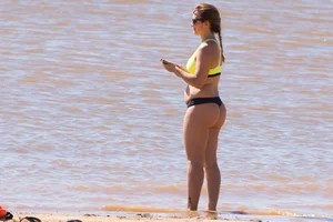 Candid beach girls in thongs