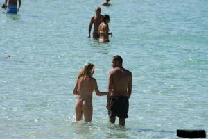 Bunch of sexy ladies on a nude beach