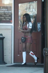 Sexy ebony Tilted Kilt employee in her uniform