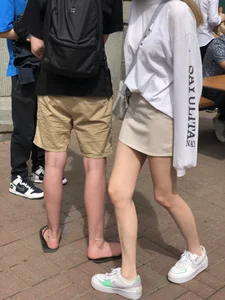 Blonde candid teen in shorts with hot slim legs street creepshots