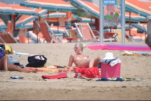 Girls on a nude beach in Bibione, Italy