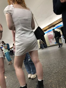 Group of Teens in Short Dresses in a Subway Train and on an Escalator Gallery