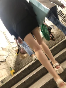 Amazing long and skinny legs (and feet in sandals) in subway